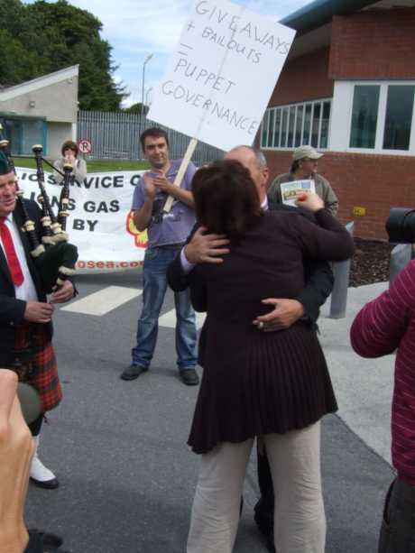 Click on image to see full-sized version Pat being embraced by his wife Mary