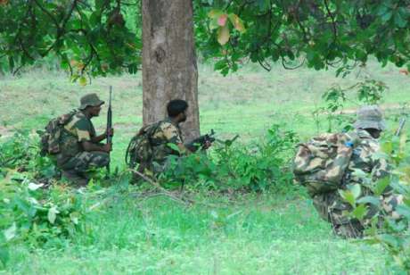 Click on image to see full-sized version Heavily armed State paramilitary forces inside the bushe